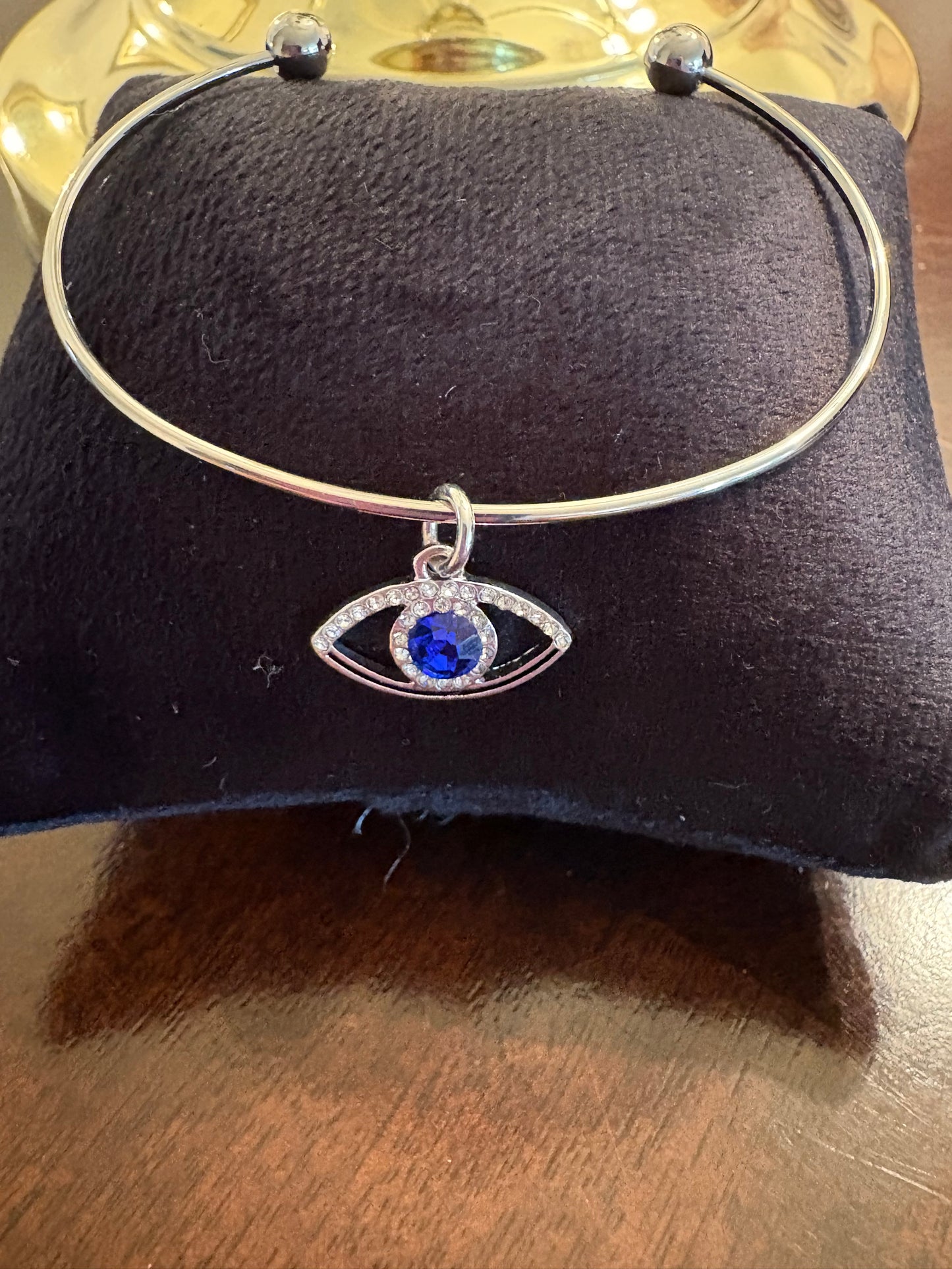 Silver bracelet with evil eye charm