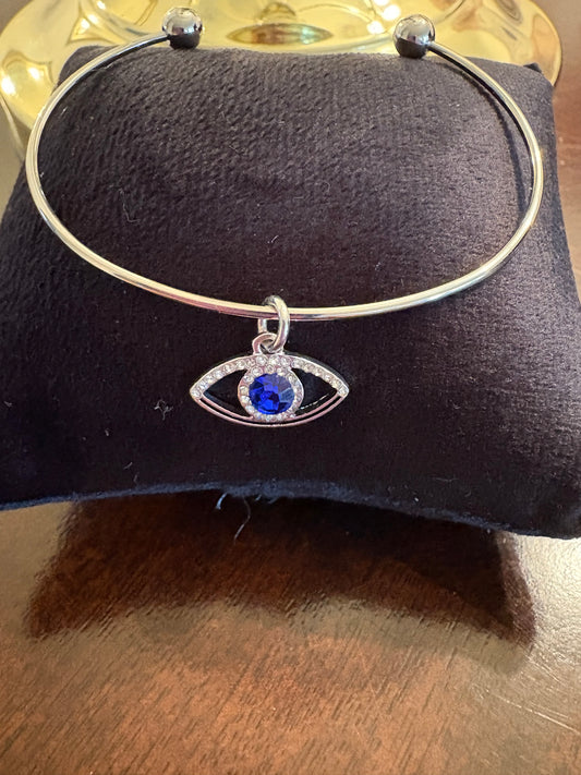 Silver bracelet with evil eye charm