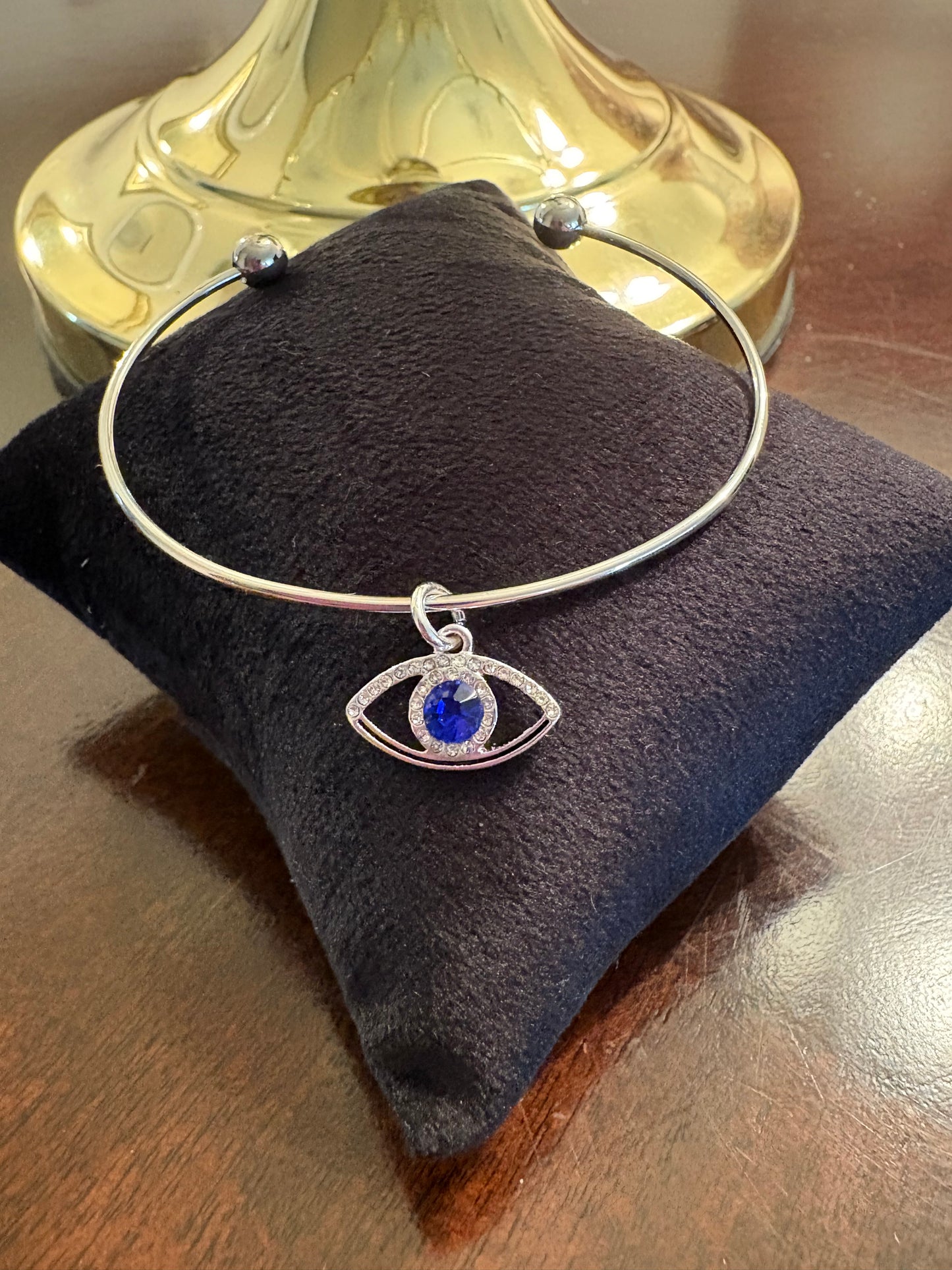 Silver bracelet with evil eye charm