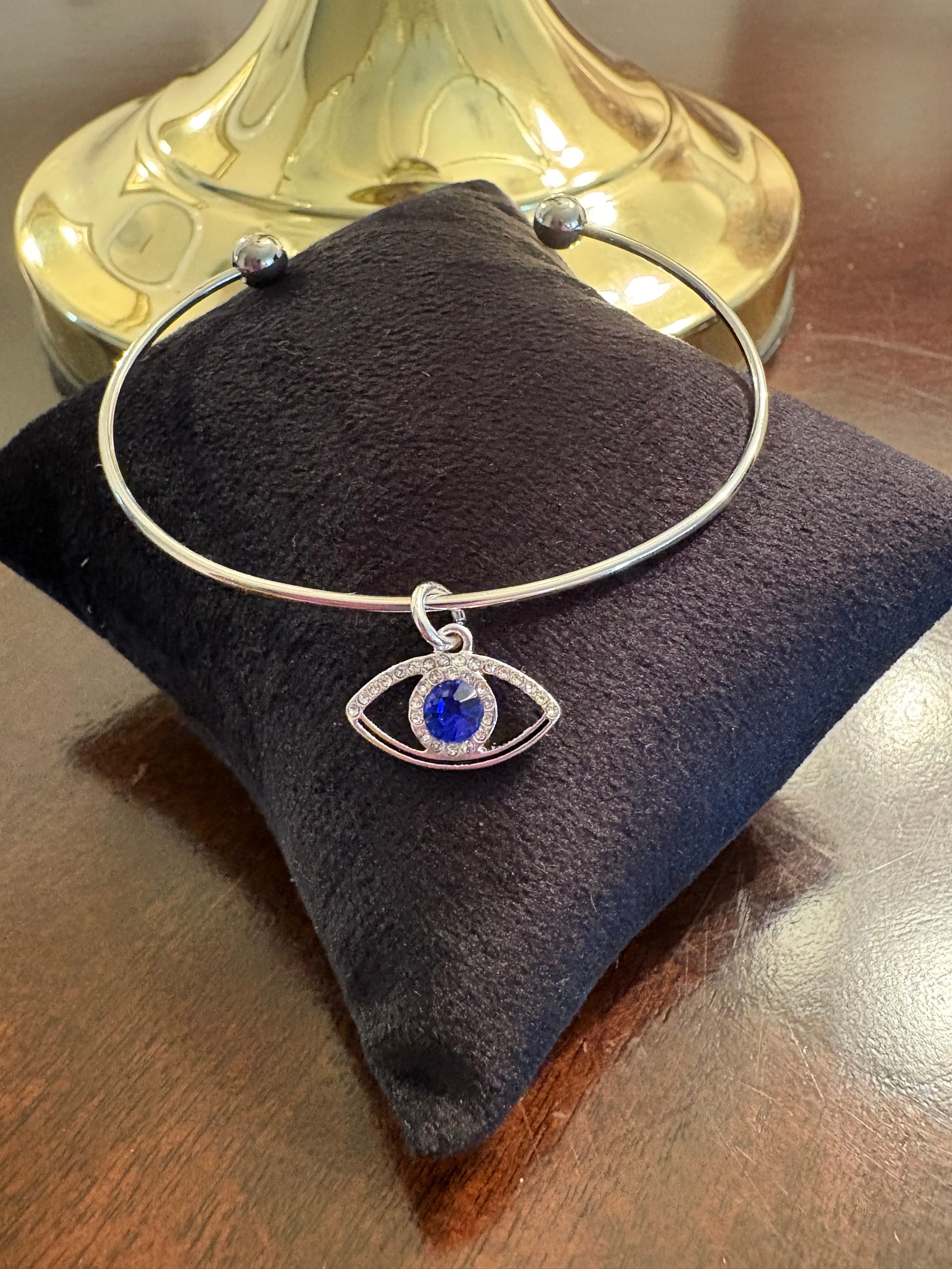 Silver bracelet with evil eye charm