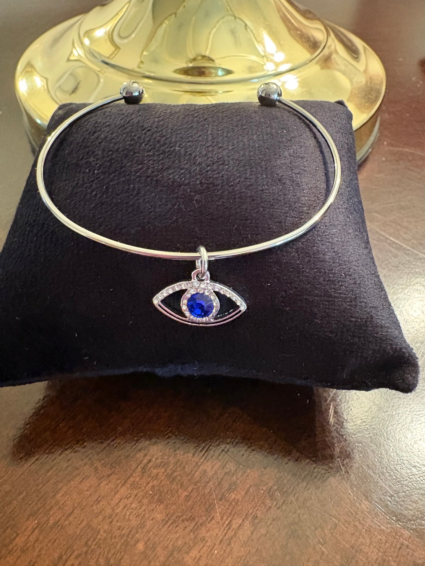 Silver bracelet with evil eye charm