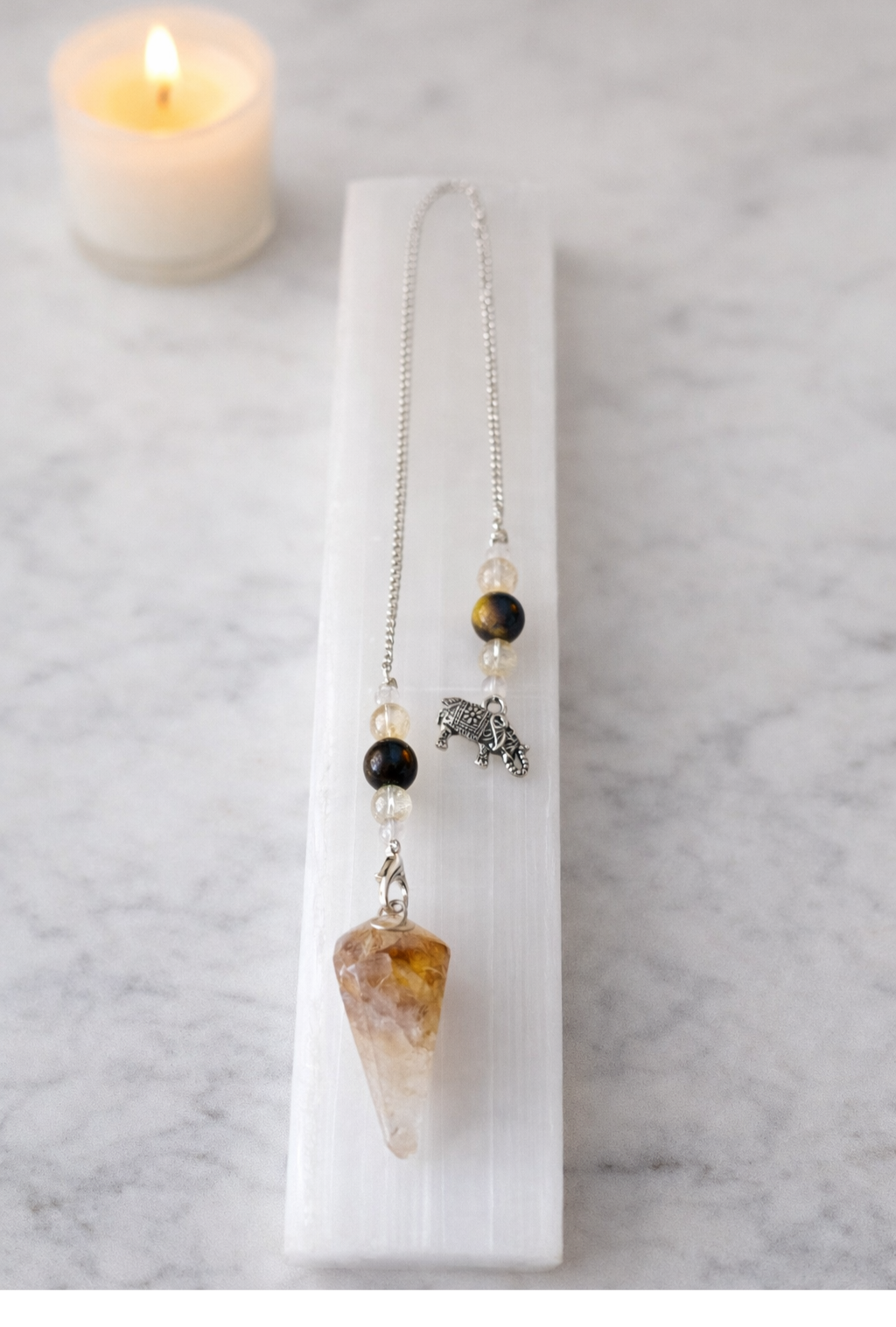 Golden Healer Quartz Pendulum with Elephant Charm